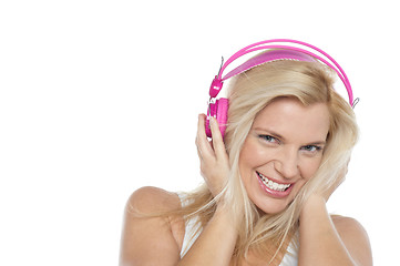 Image showing Woman enjoying music with headphones on