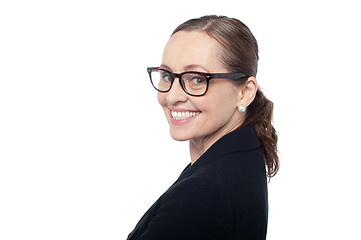 Image showing Side profile of a woman wearing spectacles