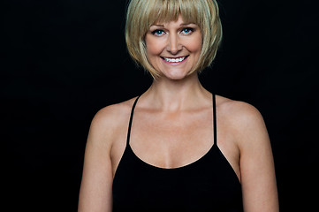 Image showing Glamorous woman in sleeveless black spaghetti top