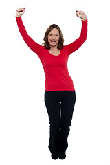 Image showing Jubilant lady celebrating her success