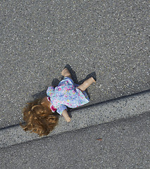 Image showing doll on the street