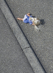 Image showing doll on the street