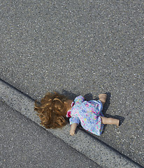 Image showing doll on the street