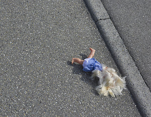 Image showing doll on the street