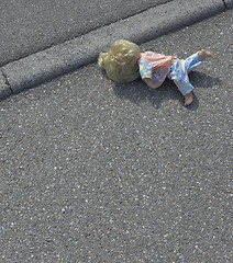 Image showing doll on the street