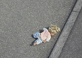 Image showing doll on the street