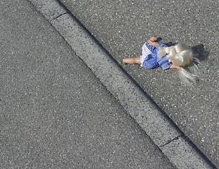 Image showing doll on the street