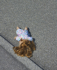 Image showing doll on the street