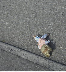 Image showing doll on the street