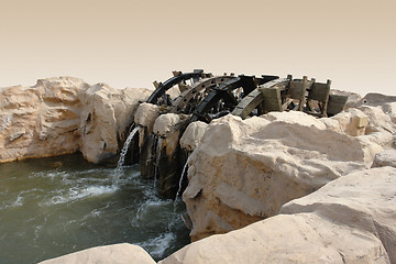 Image showing historic water wheel