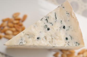 Image showing gorgonzola cheese fresh cut and pinenuts