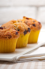 Image showing fresh chocolate and raisins muffins