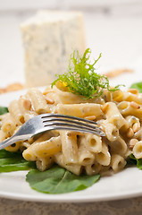 Image showing Italian pasta penne gorgonzola and pine nuts