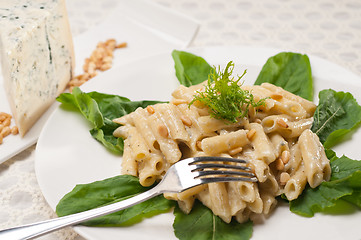 Image showing Italian pasta penne gorgonzola and pine nuts