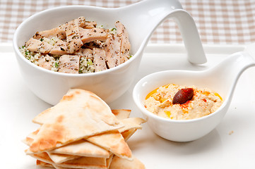 Image showing chicken taboulii couscous with hummus