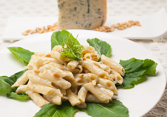 Image showing Italian pasta penne gorgonzola and pine nuts