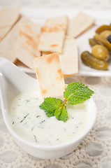 Image showing Greek Tzatziki yogurt dip and pita bread