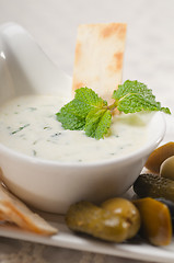 Image showing Greek Tzatziki yogurt dip and pita bread