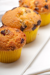 Image showing fresh chocolate and raisins muffins