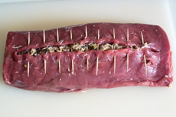 Image showing Preparing a laced beef