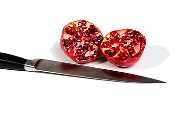 Image showing pomegranates and knife