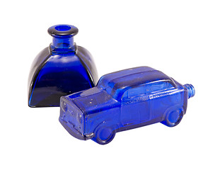 Image showing retro glass blue car small alcohol bottle isolated 