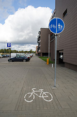 Image showing pedestrian bicycle sign way flat house car parking 