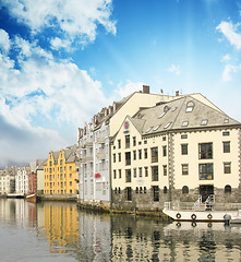 Image showing Small harbor in downtown of Alesund, with Reflections - Norway