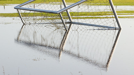 Image showing Football goal in a flooded field