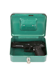 Image showing 9mm pistol in a metal case