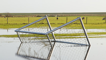 Image showing Football goal in a flooded field