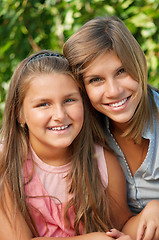 Image showing Happy sisters