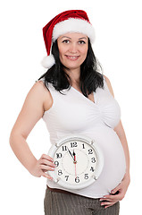 Image showing Pregnant woman with clock