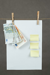 Image showing Memory note paper with Euro moneys hanging on cord