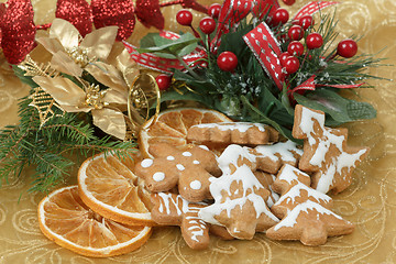 Image showing christmas background with needles. orange slices and gingerbreads