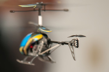 Image showing Flying RC helicopter