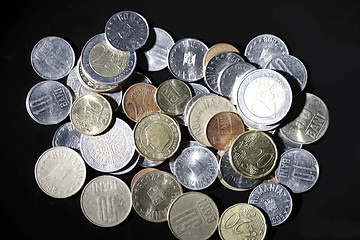 Image showing Coins on black