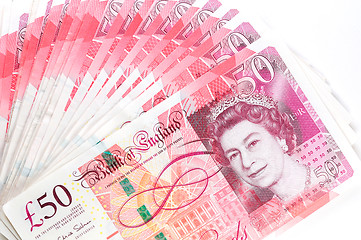 Image showing 50 pound sterling bank notes closeup view business background