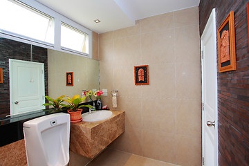 Image showing Luxury modern bathroom suite with bath and wc