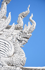 Image showing White thai art stucco wall,Thai temple 