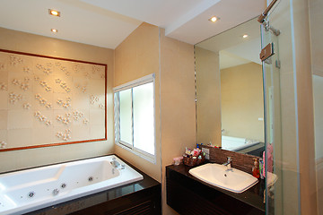 Image showing Luxury modern bathroom suite with bath and wc