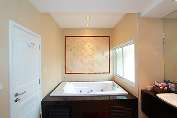 Image showing Luxury modern bathroom suite with bath and wc