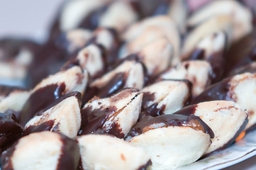 Image showing pastry cookies sandwich in chocolate