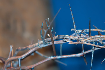 Image showing Crown of thorns hung around the Easter cross