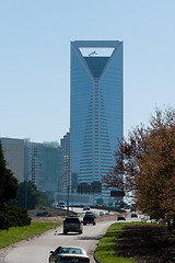 Image showing highway road leads to city skyscraper
