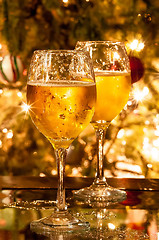 Image showing Two champagne glasses ready to bring in the New Year