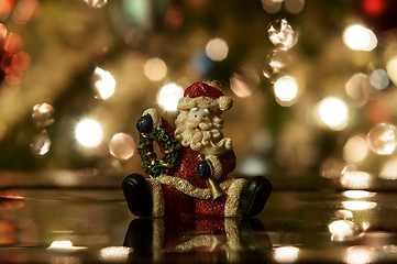 Image showing Festive santa with Christmas light background