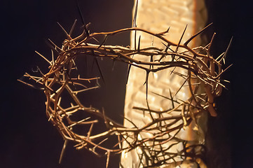 Image showing Crown of thorns hung around the Easter cross