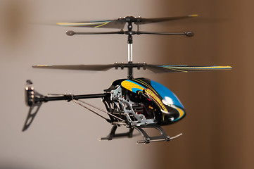 Image showing Flying RC helicopter