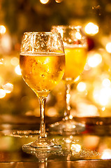 Image showing Two champagne glasses ready to bring in the New Year